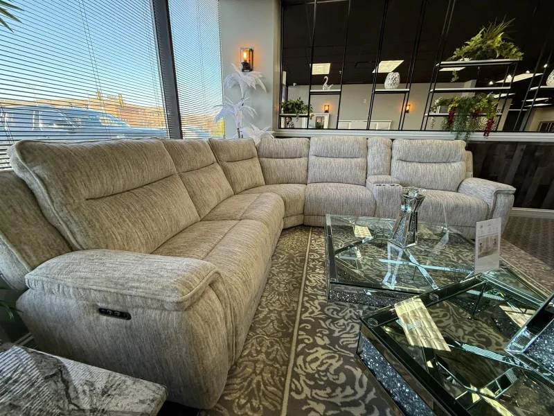 Beige power reclining sectional on the Galaxy Furniture showroom floor in Philadelphia